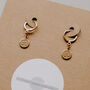 Ohm Gold Brass Charm Hoop Earrings, thumbnail 1 of 4