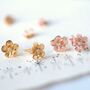 Plumeria Gold And Rose Gold Flower Stud Earrings, thumbnail 1 of 11
