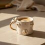 Handmade White Daisy Ceramic Mug With Gold Handle, thumbnail 1 of 2