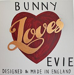 A red heart with the words 'Bunny Loves Evie' written over it