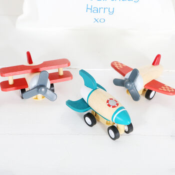 Wooden Planes And Rocket Toys In Personalised Bag, 2 of 5