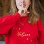 Christmas 'Believe' Sweatshirt In Red, thumbnail 1 of 2