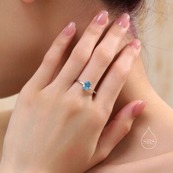 Sterling Silver Natural One Carat Swiss Blue Topaz Oval Ring, 4 of 11
