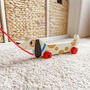 Children's Wooden Sausage Dog Pull Along Toy, thumbnail 1 of 5