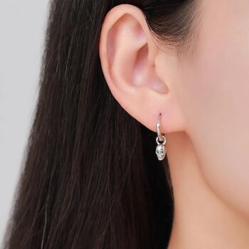 Mismatched Tiny Skull And Sword Huggie Hoop Earrings In Sterling Silver, 2 of 7
