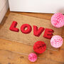 Neon Pink And Red Love Block Letters Doormat, thumbnail 1 of 2