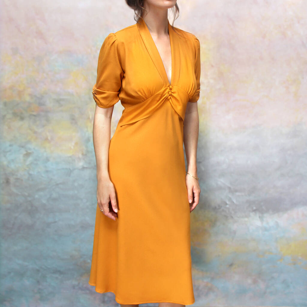 Image of Elegant Midi Length Tea Dress In Saffron Crepe