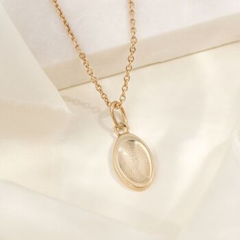 Personalised Tiny Oval Dimple Fingerprint Necklace, 2 of 9