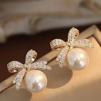Bauble Ball And Crystal Bow Earring, 2 of 3
