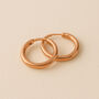 Mini Rose Gold Plated Sterling Silver Huggie Hoop Sleeper Earrings, thumbnail 1 of 6