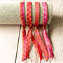 Set Of Four Festival Ribbon Bracelets, Orange/Pink, thumbnail 3 of 5