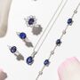 Blue Sapphire Round Cut Three Stone Engagement Ring In Sterling Silver And Gold, thumbnail 4 of 12
