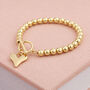 Gold Plated Bead Bracelet With Heart Charm, thumbnail 1 of 7