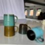 Set Of Four Reactive Glaze Mugs In Lagoon Glazes, thumbnail 6 of 9
