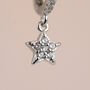 Sterling Silver And Diamante Star Huggie Earrings, thumbnail 6 of 7