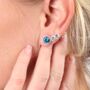 Topaz Blue Cubic Zirconia Halo Stud Earrings In Sterling Silver, thumbnail 1 of 5