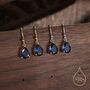 Sterling Silver Sapphire Blue Pear Cut Cz Drop Earrings, thumbnail 1 of 12
