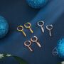 Sterling Silver Tiny Feather Huggie Hoops, thumbnail 3 of 12