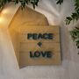 Peace And Love Mini Garland Christmas Card, thumbnail 1 of 4