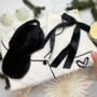 Luxury Christmas Pyjama Gift Set For Her With Eye Mask And Satin Hair Bow In Cream And Black, thumbnail 1 of 10