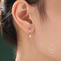 Sterling Silver Moonstone Droplet Huggie Hoop Earrings, thumbnail 1 of 10