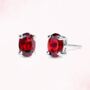 Garnet Oval Stud Earrings In Sterling Silver And Gold, thumbnail 1 of 11