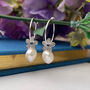 Sterling Silver Flower And Pearl Drop Hoop Earrings, thumbnail 1 of 10