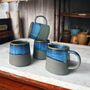 Set Of Four Reactive Glaze Mugs In Matt Grey And Denim, thumbnail 1 of 2