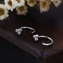 Sterling Silver Tiny Three Ball Huggie Hoop Earrings, thumbnail 1 of 9