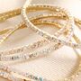 Set Of Five Clear Crystal Tennis Bracelets In Gold, thumbnail 2 of 2
