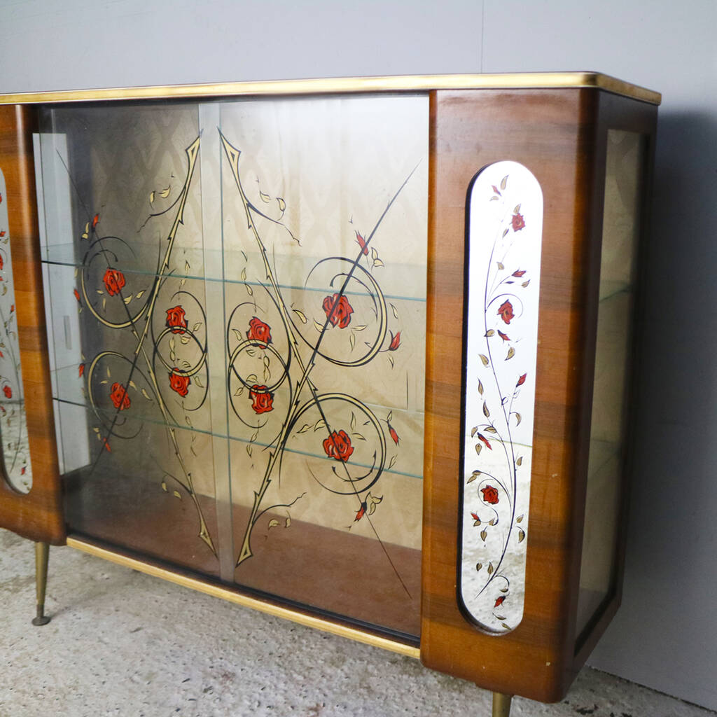 1950’s vintage glass display by proper.