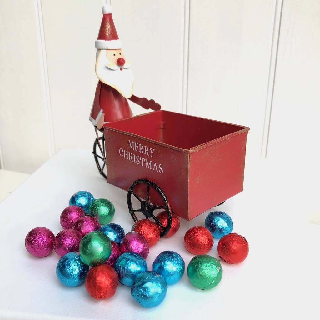 Santa On Trike With Chocolate Treats, 1 of 4