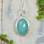 Natural Oval Emerald Necklace In Sterling Silver, thumbnail 1 of 3