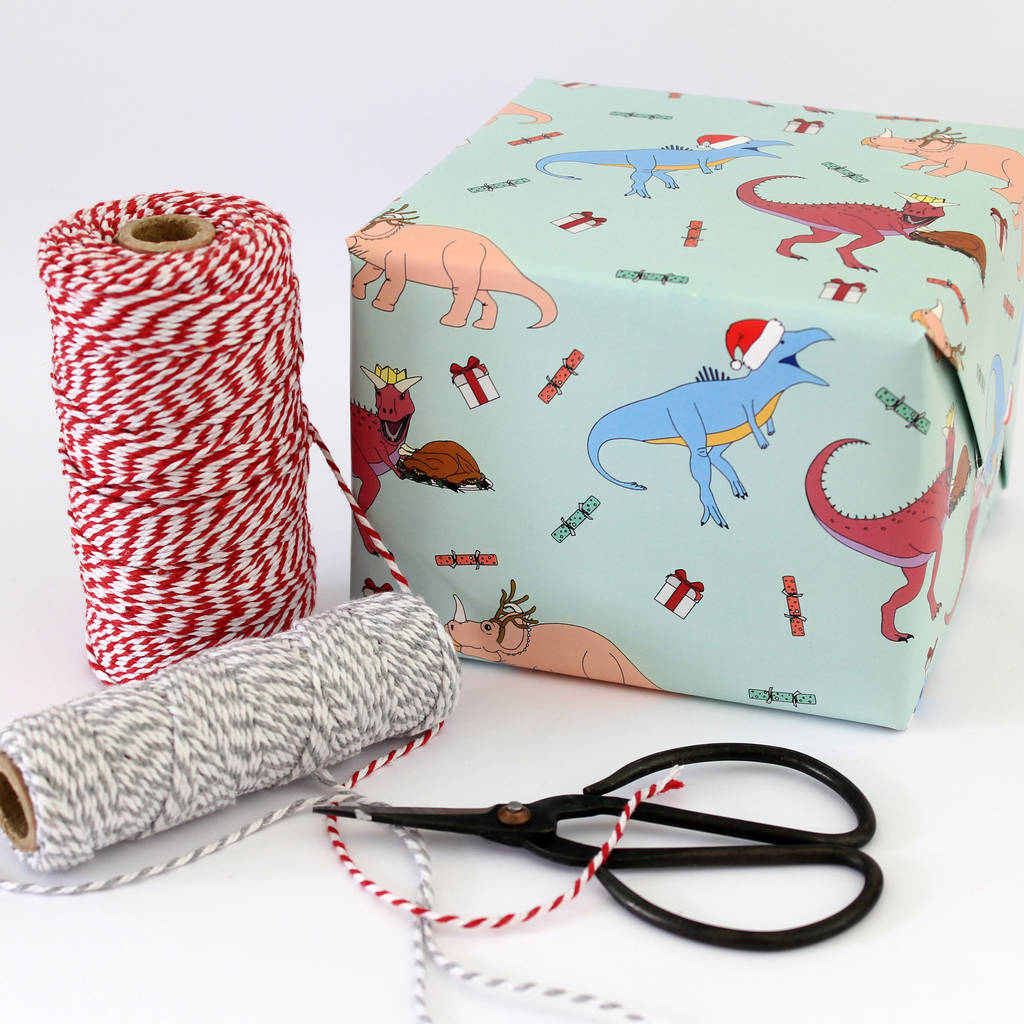 dinosaur christmas dinner wrapping paper by charlotte filshie