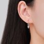 Mismatched Skull And Sword Huggie Hoop Earrings In Sterling Silver, thumbnail 2 of 11