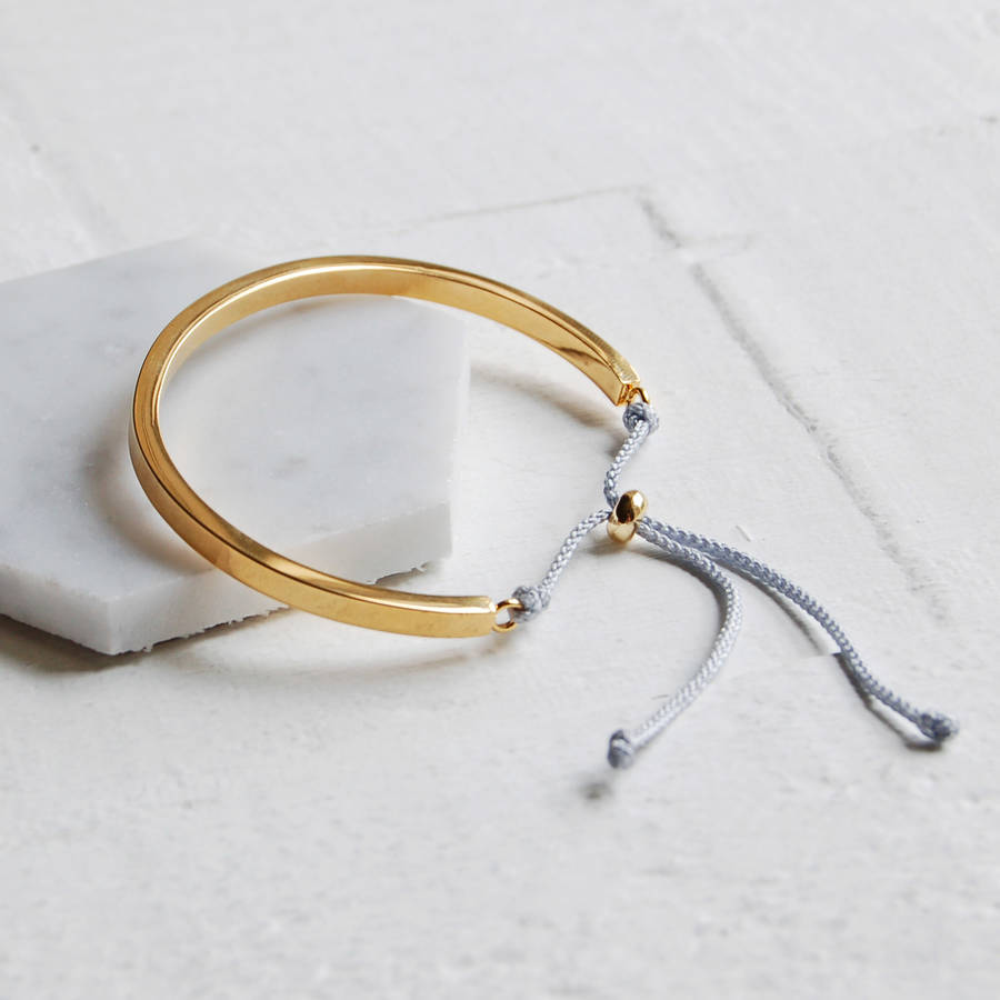 Gold Cuff Bangle With Grey Cord By Highland Angel