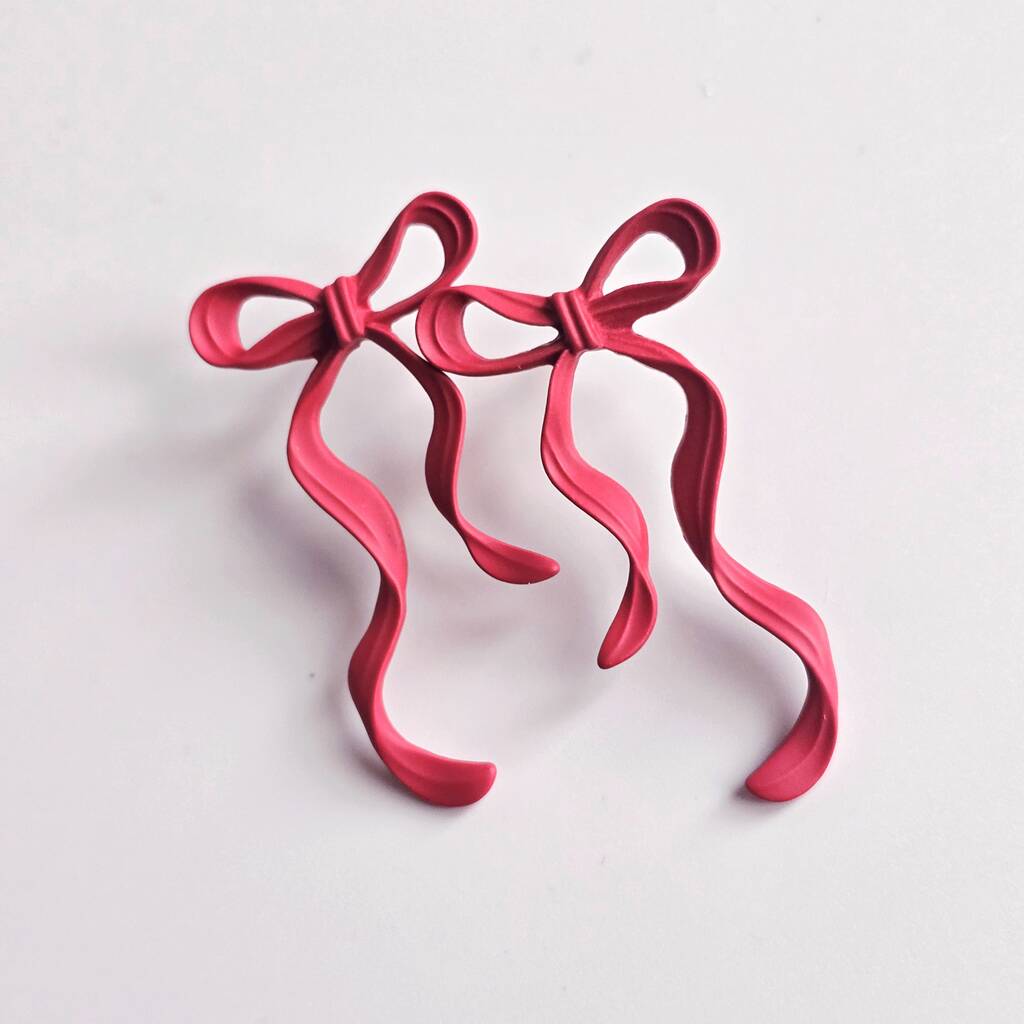 Matte Red Bow Christmas Statement Earrings, 1 of 3