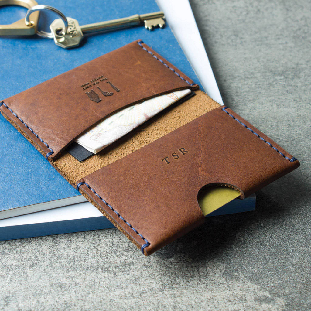 personalised leather bi fold card holder by man gun bear
