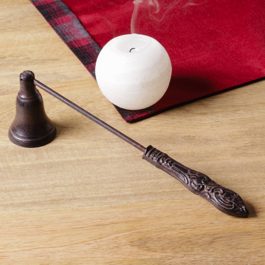 antique bronze iron candle snuffer by dibor