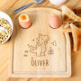 Personalised Dinosaur Egg And Soldiers Toast Board, thumbnail 4 of 5