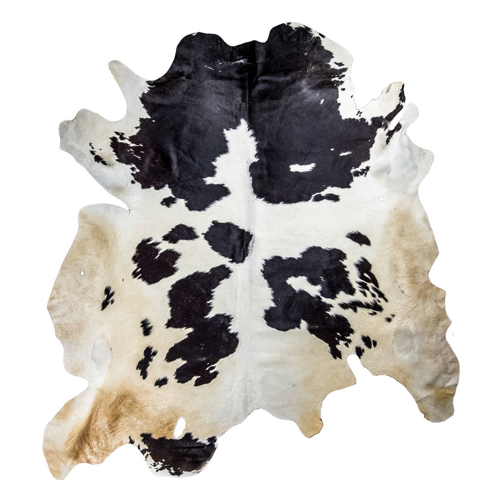 black and white natural cowhide rug by mahi leather