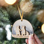 Personalised Baby's First Christmas Snow Globe Bauble, thumbnail 1 of 3