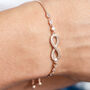Rose Gold Coloured Infinity Bracelet, thumbnail 1 of 3