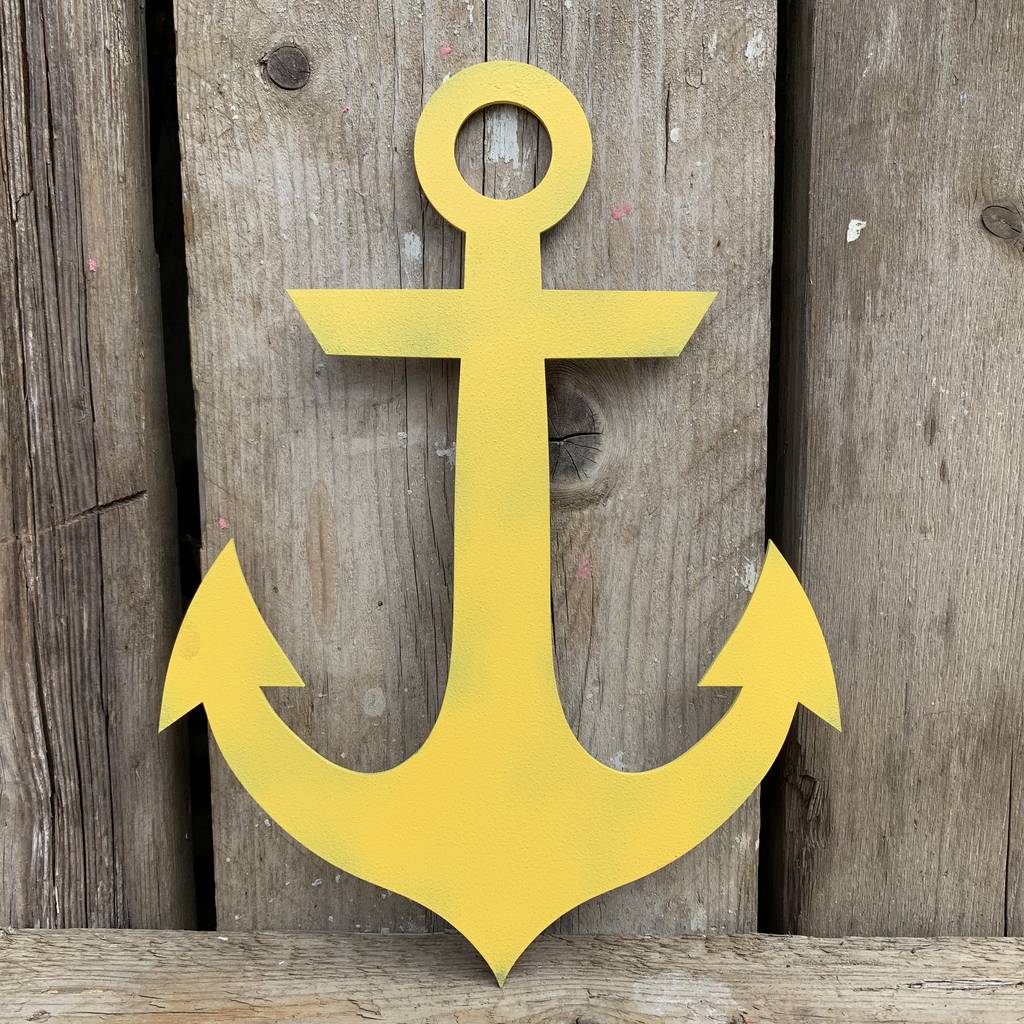 colourful anchor ship boat nautical sign by the rustic warehouse