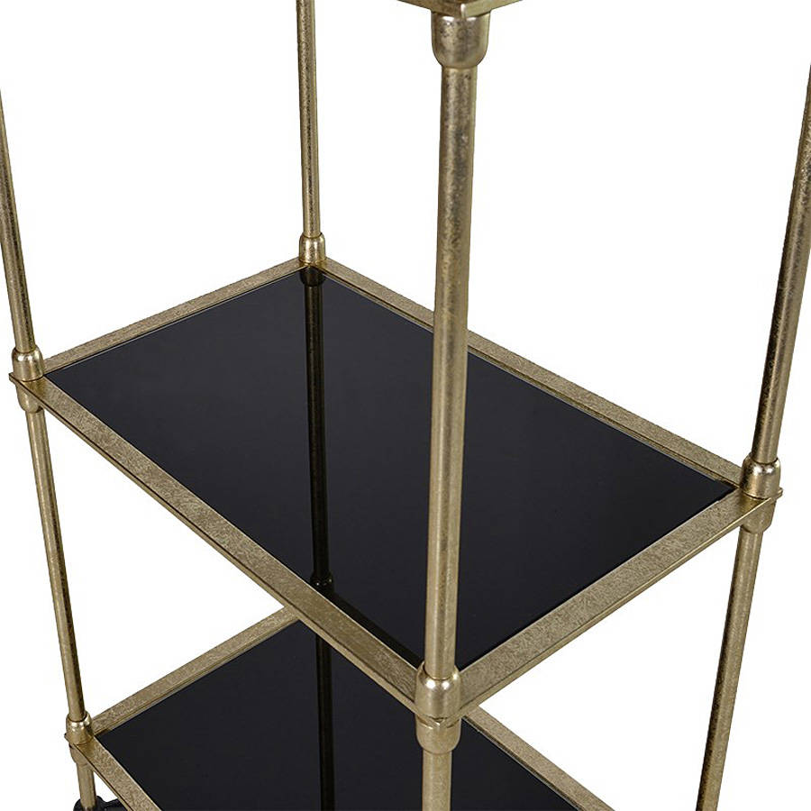 tall gold shelving unit by out there interiors