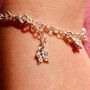 Girl's Charm Bracelet With Six Sterling Silver Charms, thumbnail 2 of 5