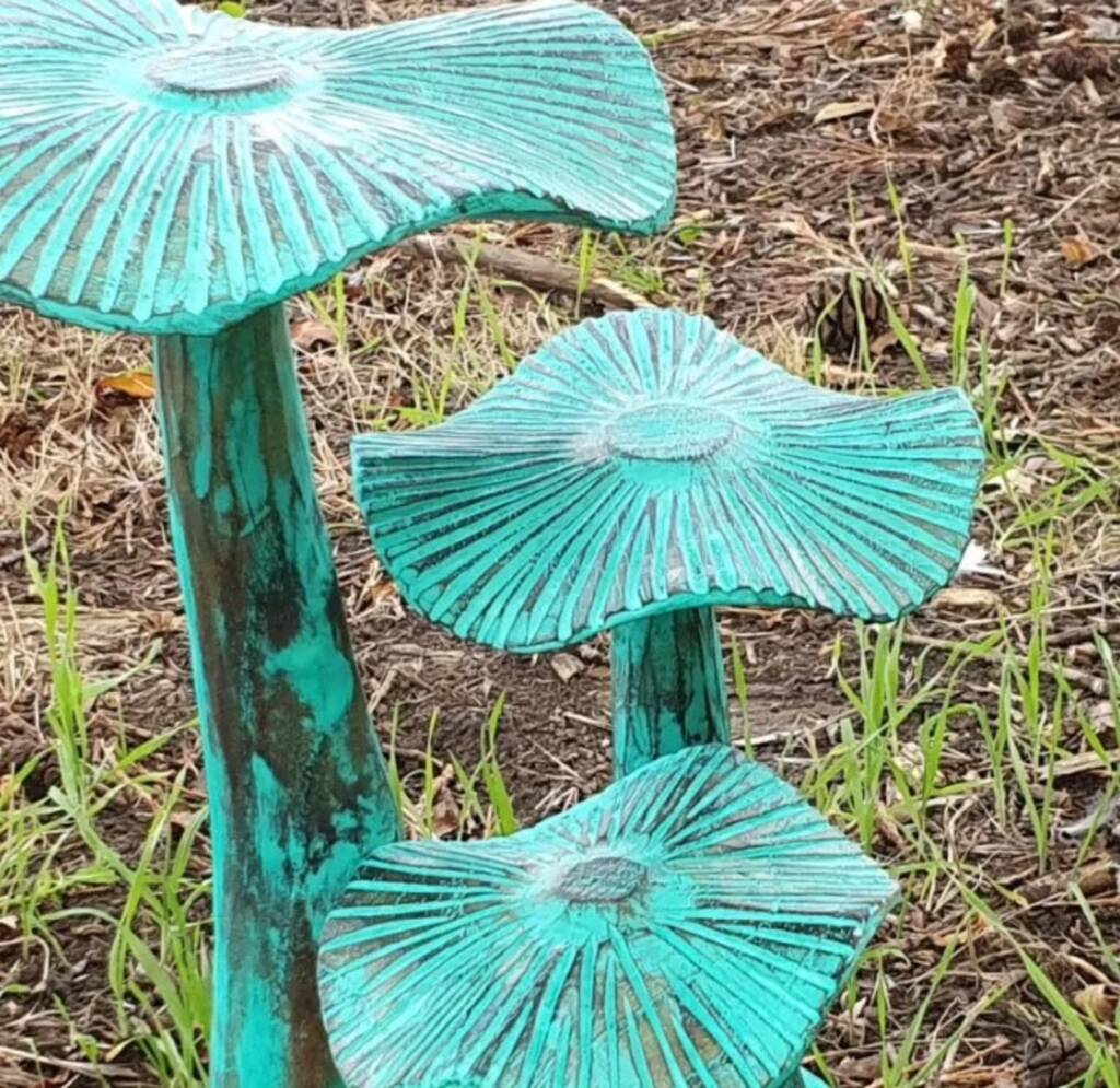 Turqouise Set Of Three Wooden Mushrooms On A Base