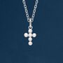 Tiny Genuine Pearl Cross Necklace In Sterling Silver, thumbnail 1 of 11