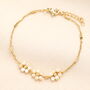 Stainless Steel Triple Flower Barrel Chain Bracelet In Gold Plating, thumbnail 1 of 4