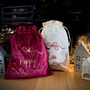 Personalised Christmas Eve Bow Sack Or Stocking, thumbnail 1 of 9